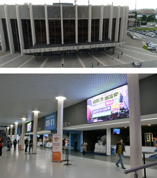 Jubilee Stadium entrance lobby with SpinetiX digital signage displays showing match information, wayfinding directions, and sponsor content