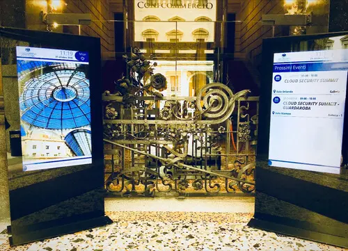 SpinetiX-powered interactive digital signage totem in Palazzo Castiglioni providing wayfinding navigation and event information for visitors