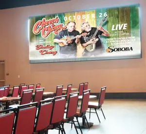 Video wall installation in Soboba Casino Resort conference center using synchronized SpinetiX players for presentations and event information